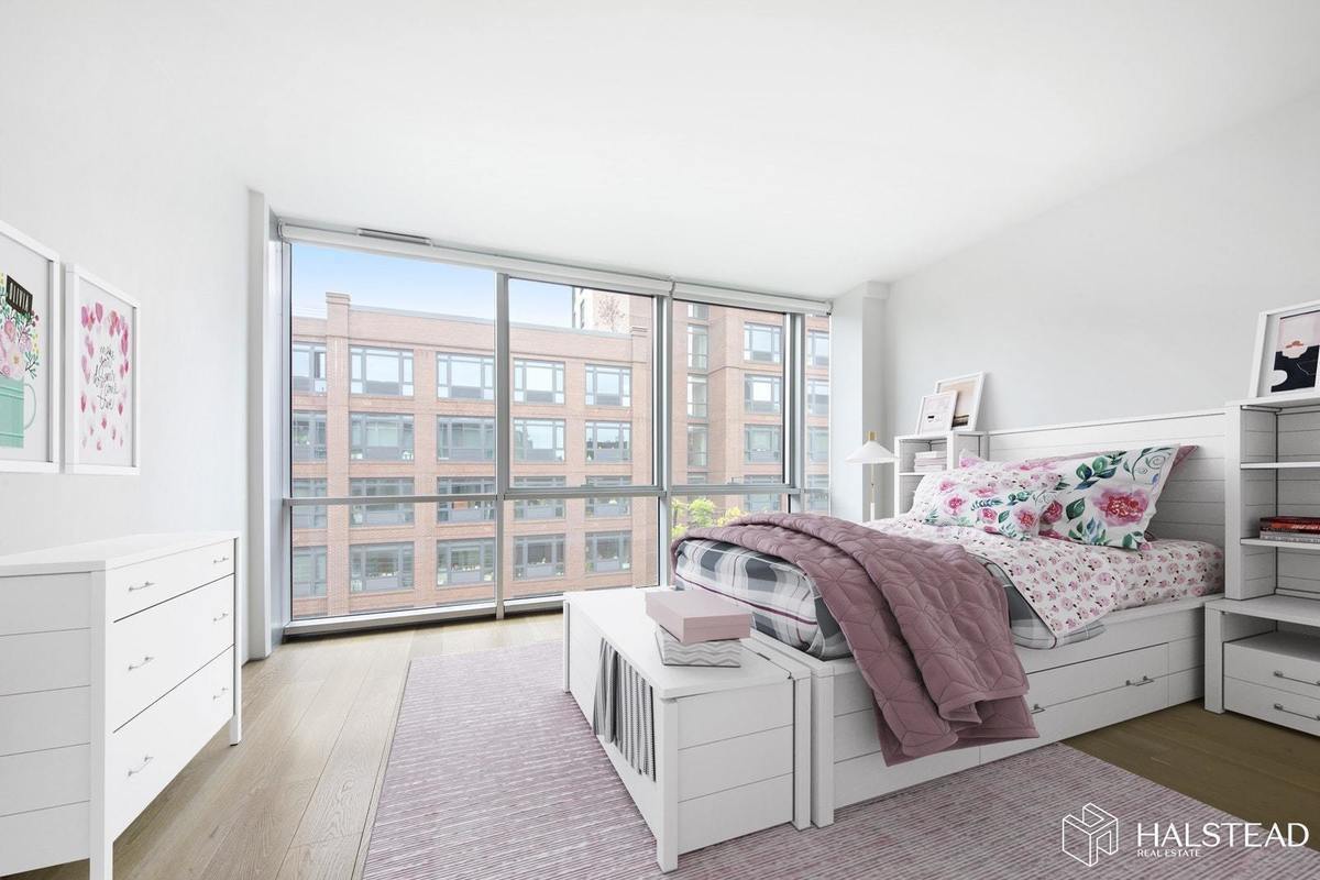 A Dumbo condo in a converted factory with views of Manhattan, for